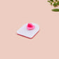 A clear acrylic pin badge with a pink heart-shaped pin back clasp. The design of the pin badge is of a cute screaming possum with the quote is it me am I the drama?