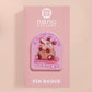 A clear acrylic pin badge with a pink heart-shaped pin back clasp. The design of the pin badge is of a cute screaming possum with the quote is it me am I the drama?