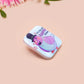 A clear acrylic pin badge with a pink heart-shaped pin back clasp. The design of the pin badge is of a cute chibi pigeon wearing a top hat with the quoteit's called fashion susan