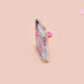 A clear acrylic pin badge with a pink heart-shaped pin back clasp. The design of the pin badge is of a cute chibi pigeon wearing a top hat with the quoteit's called fashion susan