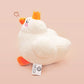 An adorable white duck bird plushie toy with cute embroidered eyes and facial expression, wearing a yellow crown hat, with a hang tag describing the duck as King Larry.