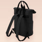 Black roll top backpack with a front pocket and an embroided mothman cryptid design with the lext live lamp lurk