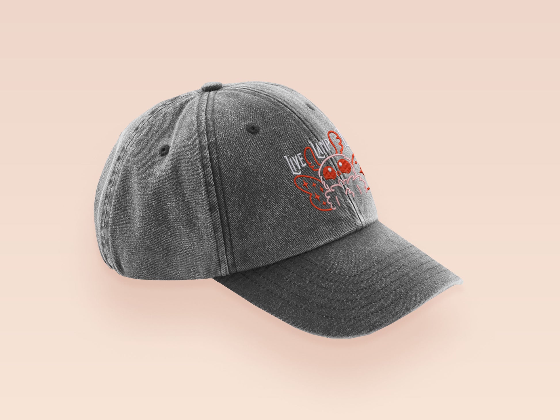 A vintage dark grey baseball cap hat with an embroidered cute chibi Mothman crytid with the quote Live Lamp Lurk.