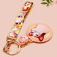 Acrylic epoxy meme cat keychain with a large acrylic charm of popcat , a smaller charm of smudge cat and a matching lanyard with multiple different internet famous meme cats.