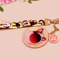 Acrylic epoxy meme cat keychain with a large acrylic charm of popcat , a smaller charm of smudge cat and a matching lanyard with multiple different internet famous meme cats.