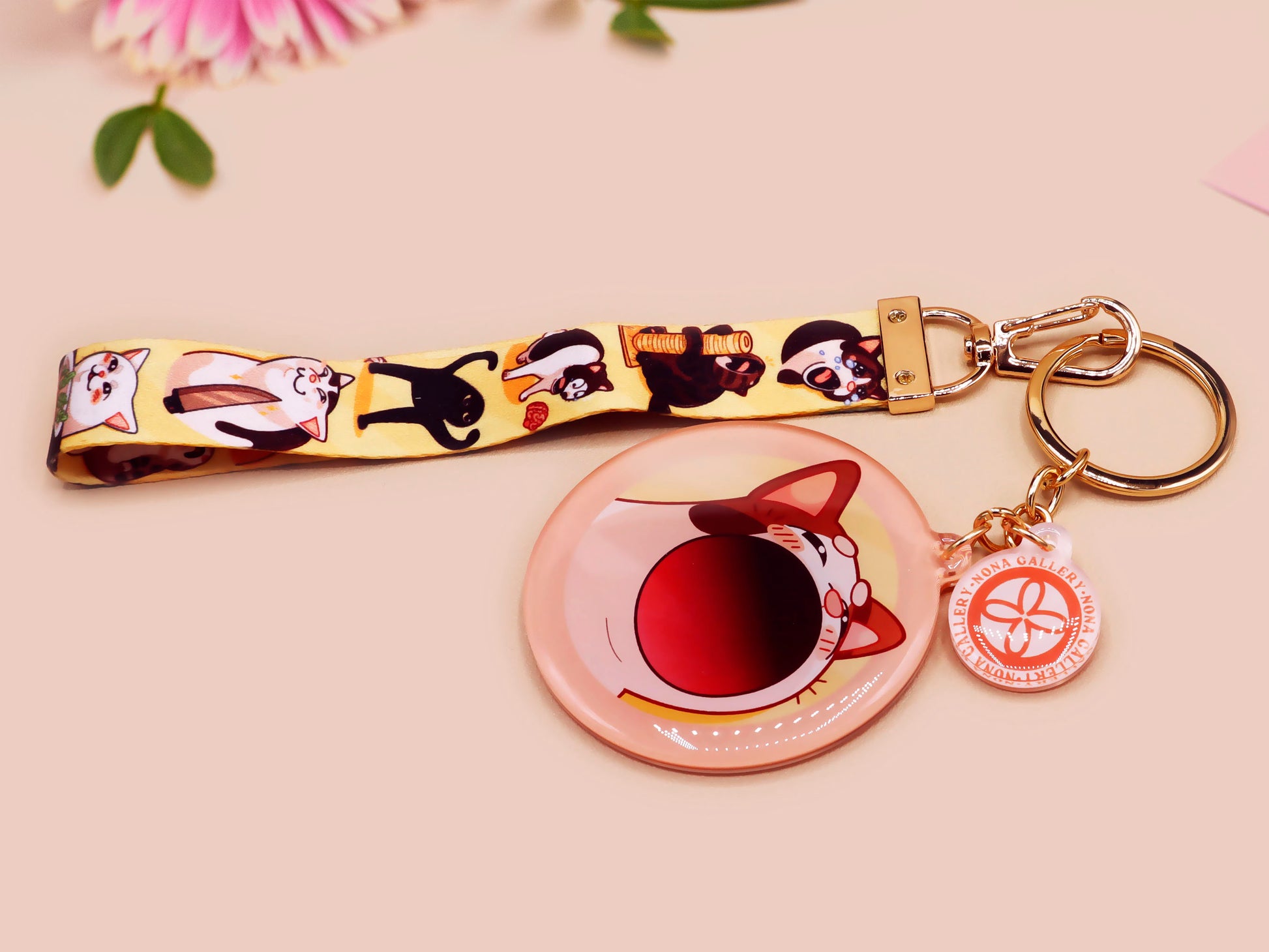 Acrylic epoxy meme cat keychain with a large acrylic charm of popcat , a smaller charm of smudge cat and a matching lanyard with multiple different internet famous meme cats.