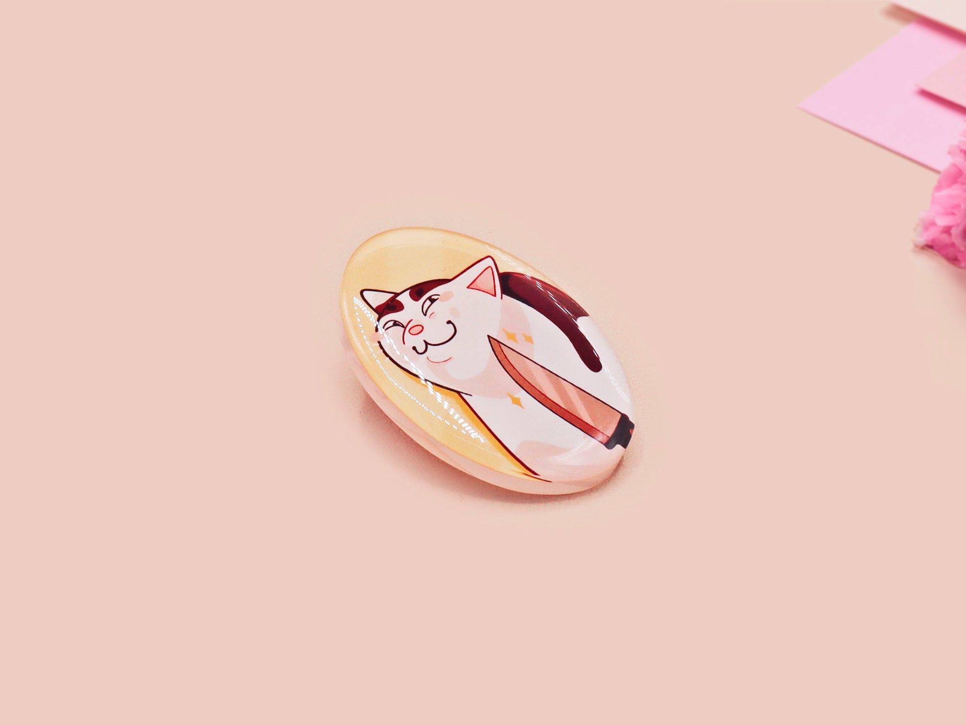 Clear acrylic pin badge with pink heart-shaped rubber pin back clasp. The design of the pin badge is a cute viral internet meme cat with a cheeky relatable reaction.