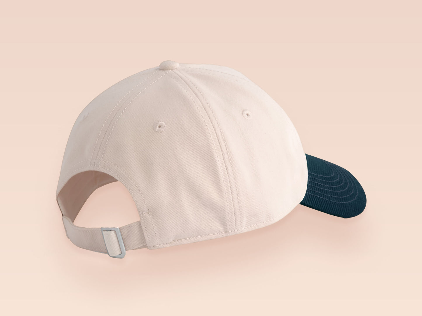 Vintage style truckers baseball cap with a contrast cream and navy peak design with an embroidered possum playing dead and the quote mildly inconveninced 