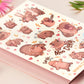 Large waterproof gloss vinyl sticker sheet of multiple cute baby pygmy hippos as well as the viral hippo Moo Deng with her hilarious TikTok reactions
