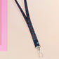 Cute full legth black lanyard with a double sided cute chibi Mothman pattern and silver swivel hook clasp.