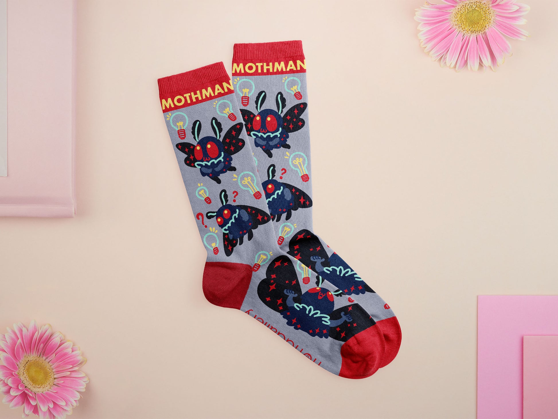 Cute knitted cotton crew socks with a cute chibi mothman fanclub design.