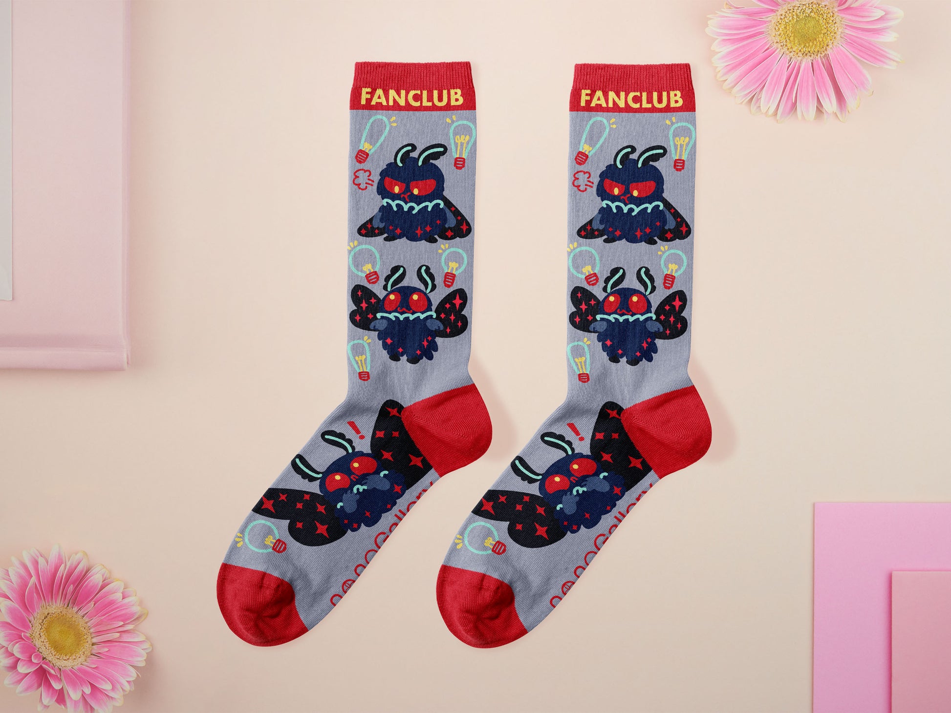 Cute knitted cotton crew socks with a cute chibi mothman fanclub design.