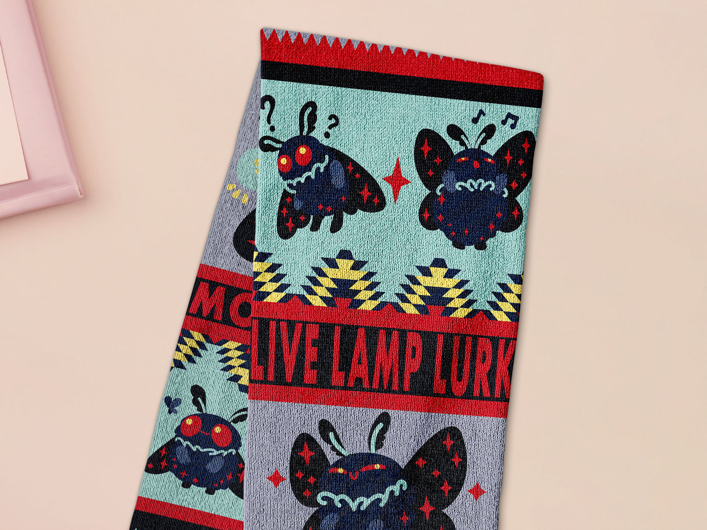 Cute knitted scraf a cryptid mothman pattern and tassles