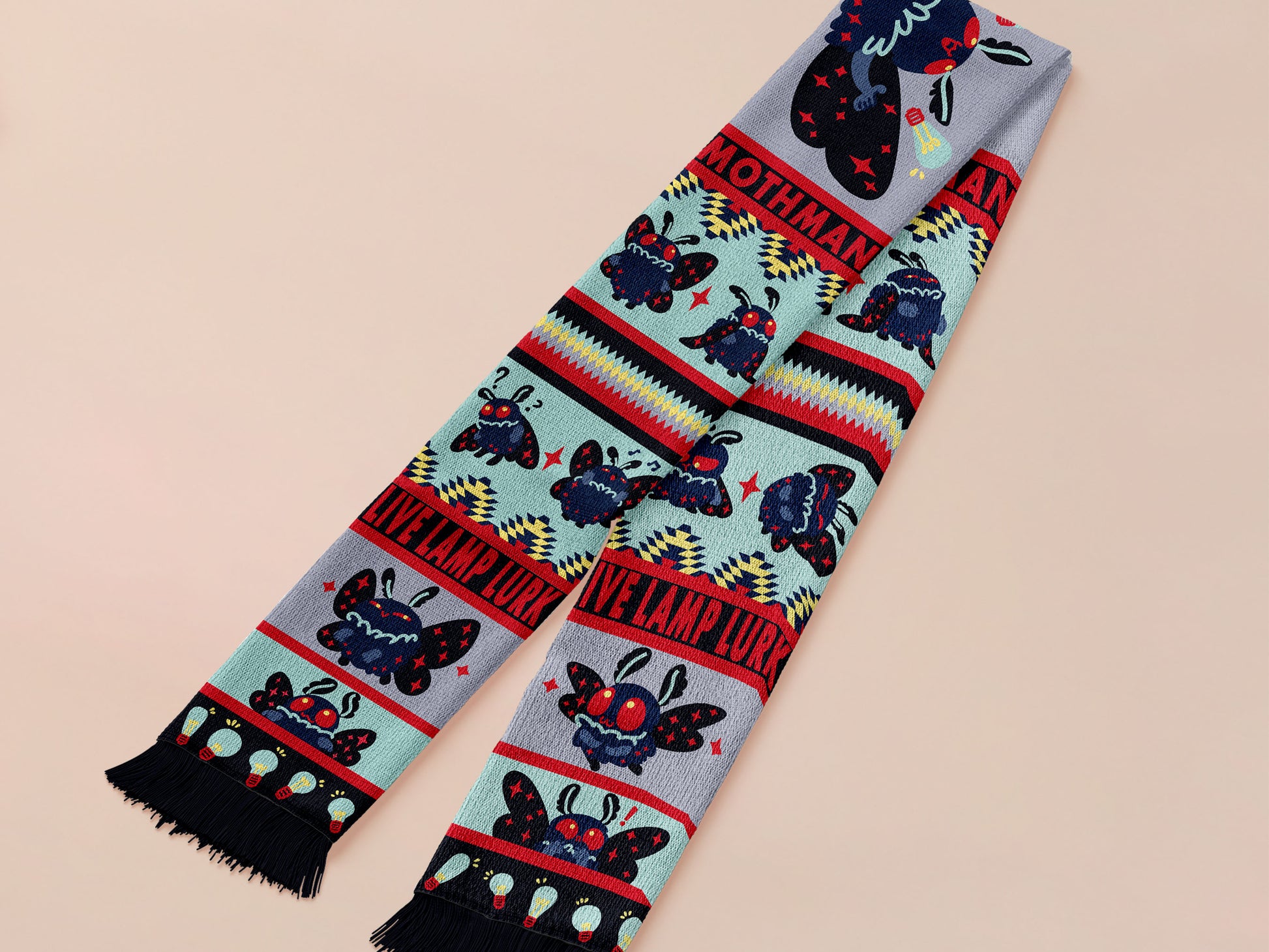 Cute knitted scraf a cryptid mothman pattern and tassles