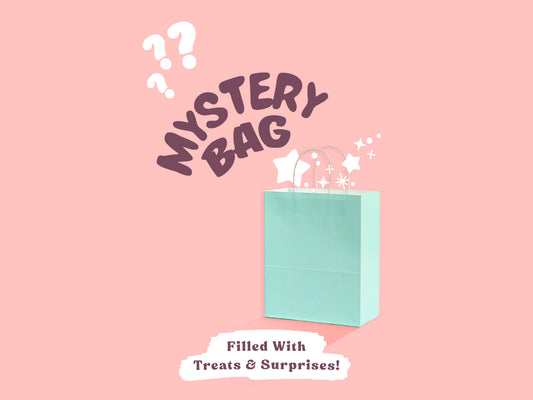 A pastel blue paper bag open with cartoon stars falling out of it, surrounded by the words Mystery Bag Filled With Treats & Surprises 