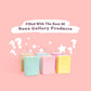 Multiple paster coloured paper bags with stars and question marks coming out of them with text above them that says Filled with the best of Nona Gallery Products