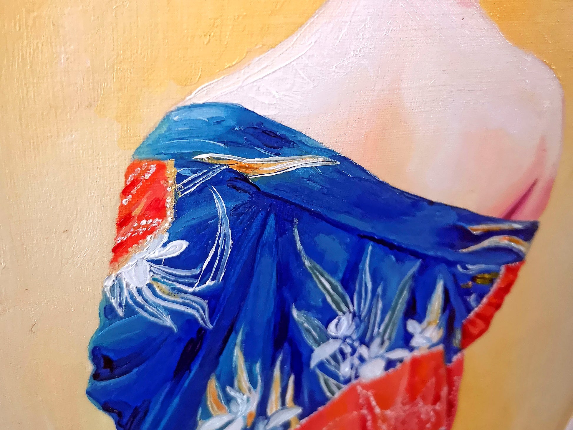 Close up of oil painting of a blue iris pattern kimono with red stripe and a yellow background.