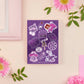 Large purple sticker sheet of digital illustrated cartoons of various space themed items and quotes