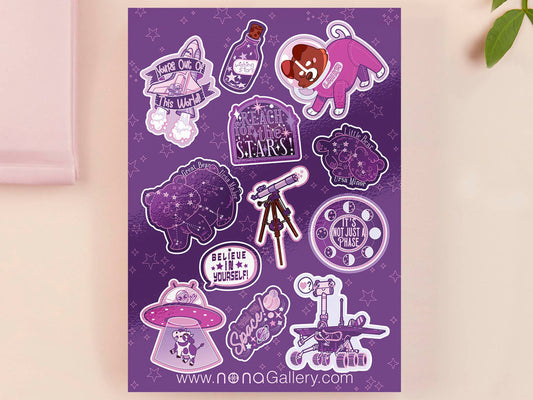 Large purple sticker sheet of digital illustrated cartoons of various space themed items and quotes