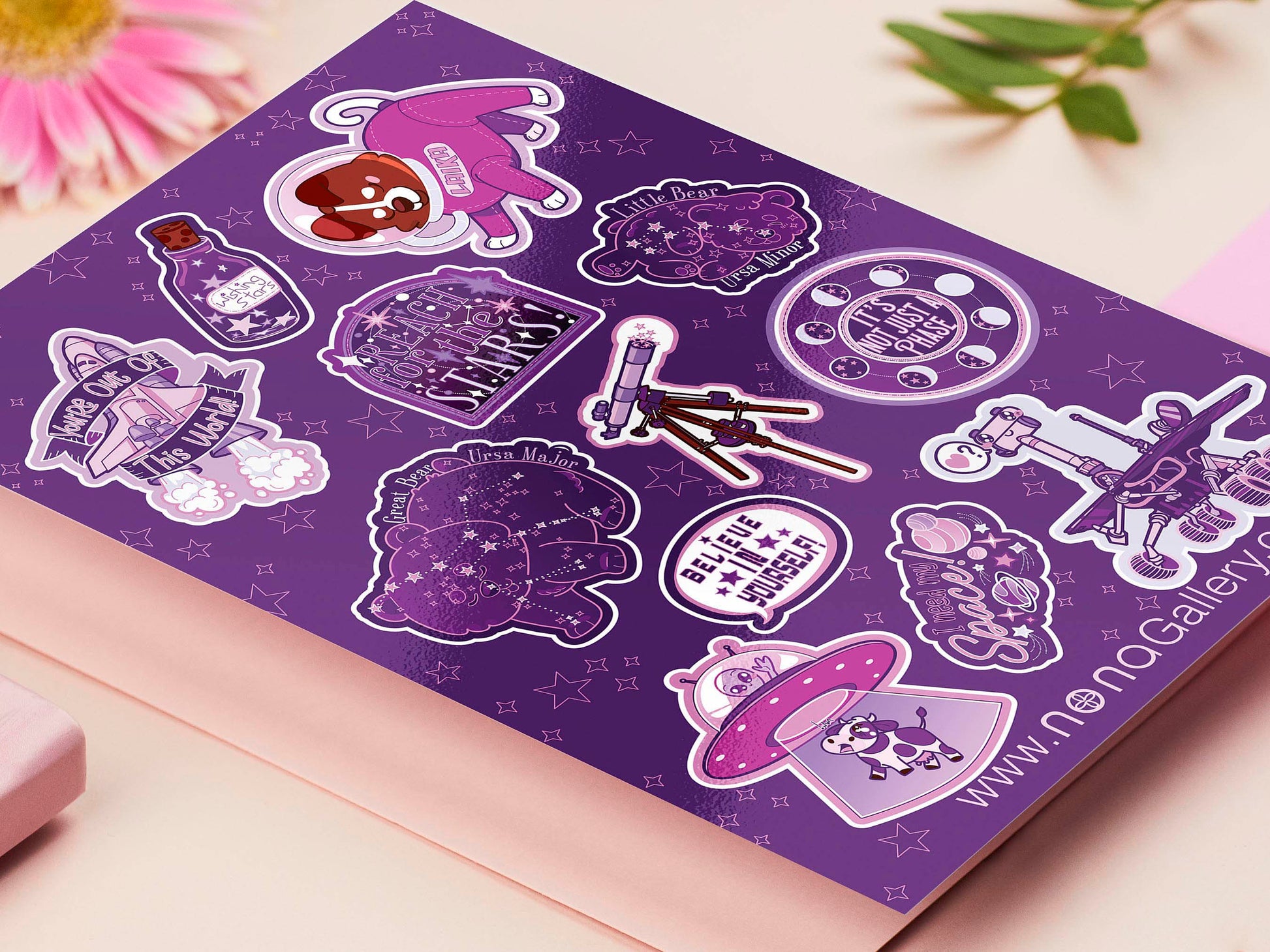 Large purple sticker sheet of digital illustrated cartoons of various space themed items and quotes