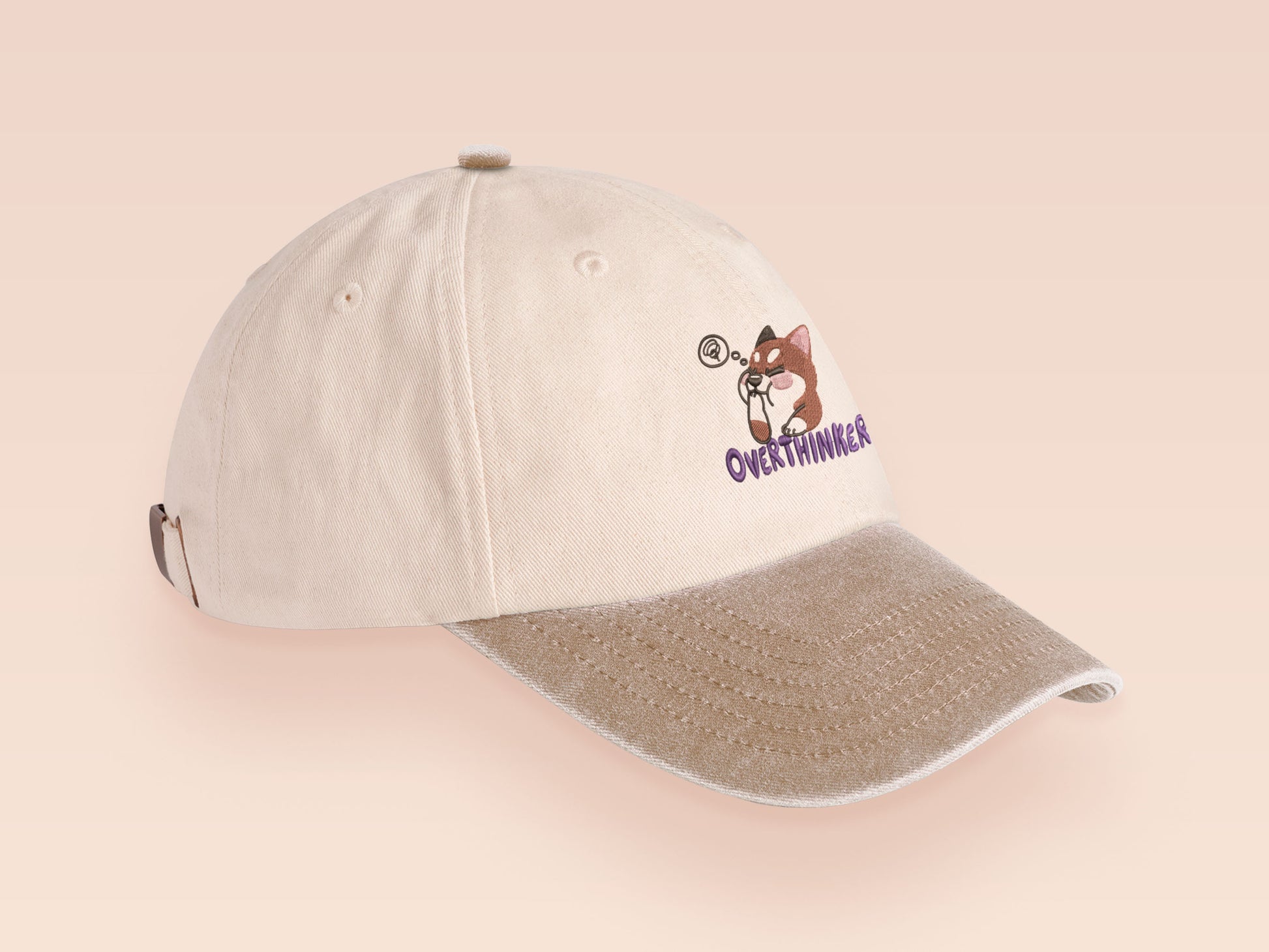 Vintage style truckers baseball cap with a contrast cream and sand peak design with an embroidered cute shiba inu dog overthinking with the quote Overthinker