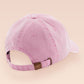 A vintage pink baseball cap hat with an embroidered cute princess cat wearing a seatbelt and holding a boba bubble tea drink with the quote Passenger Princess