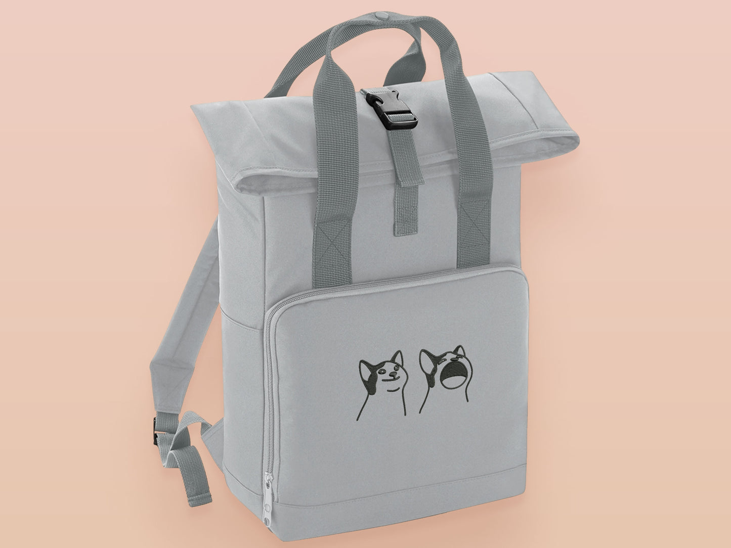 Light Grey roll top twin handle backpack with an embroidered design of the viral meme cat popcat