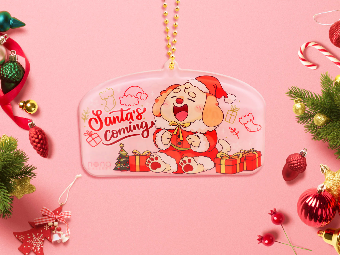 Acrylic epoxy christmas tree hanging decoration with a large acrylic charm of a cute cockapoo barley dog in a santa outfit surrounded by presents with the quoteSanta's coming