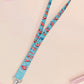 Cute full legth blue lanyard with a double sided prawn shrimp pattern and silver swivel hook clasp.