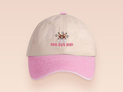 Vintage style truckers baseball cap with a contrast cream and pink peak design with an embroidered cute hanster angry and sulking with the quote smol but angy
