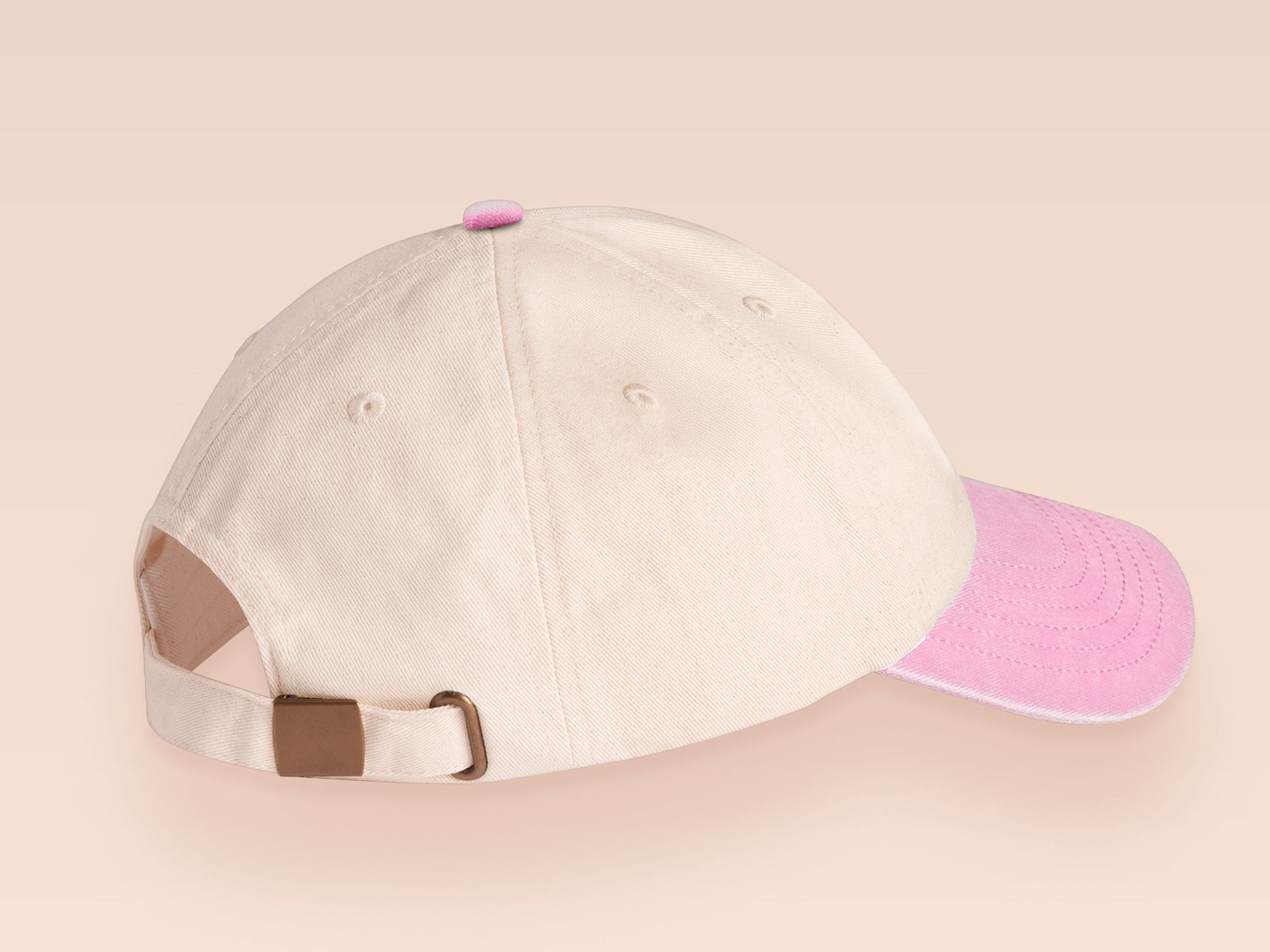 Vintage style truckers baseball cap with a contrast cream and pink peak design with an embroidered cute hanster angry and sulking with the quote smol but angy