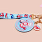 Acrylic epoxy shrimp keychain with a large acrylic charm of a a chef shrimp frying rice in a pan with the quote so you're telling me a shrimp fried this rice, a smaller charm of a cute baby shrimp and a matching blue shrimp lanyard.