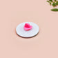 A clear acrylic pin badge with a pink heart-shaped pin back clasp. The design of the pin badge is of a cute chibi shrimp in a chefs outfit cooking with the quote So you're telling me a shrimp fried this rice?