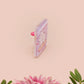 Clear acrylic pin badge with a pink heart-shaped rubber pin back clasp. The design of the pin badge is a cute chibi white cat skateboarding with the quote some people are just too cool but not me.