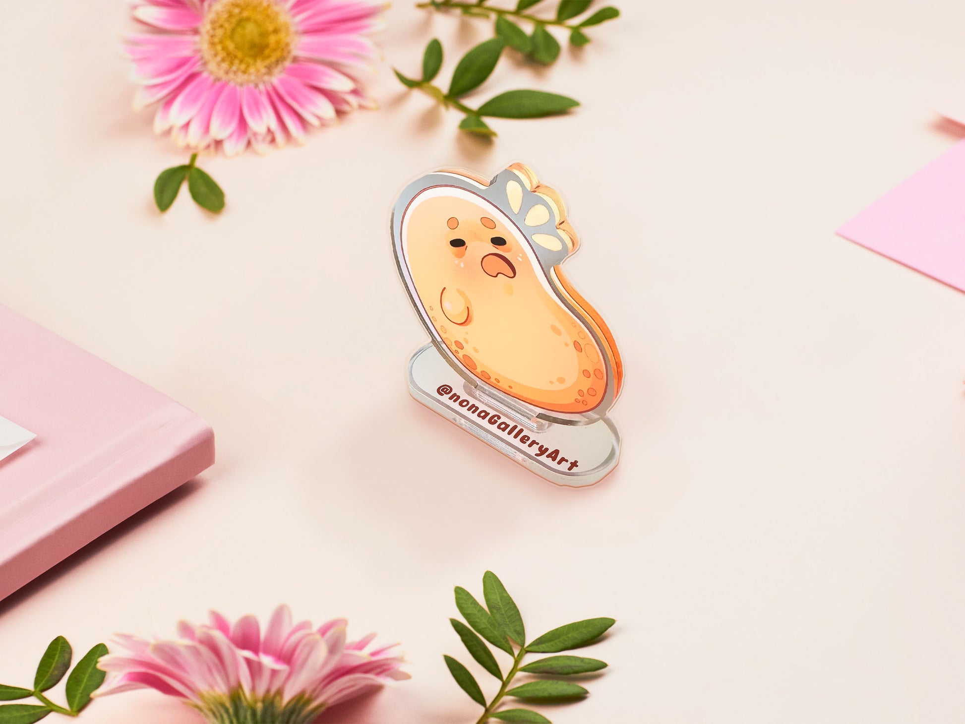 An acrylic double-sided standee desk budy featuring a cute cartoon chibi potato with a stressed expression.