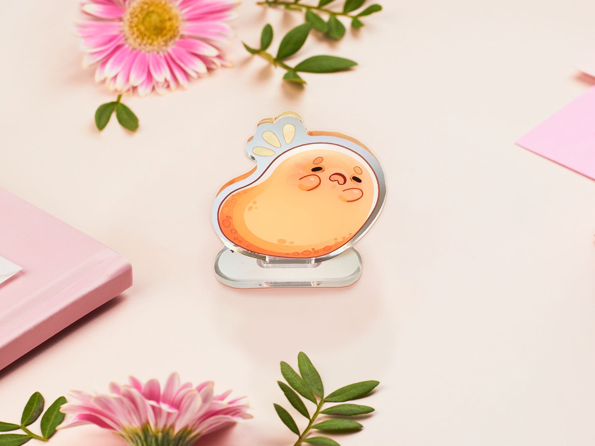 An acrylic double-sided standee desk budy featuring a cute cartoon chibi potato with a stressed expression.