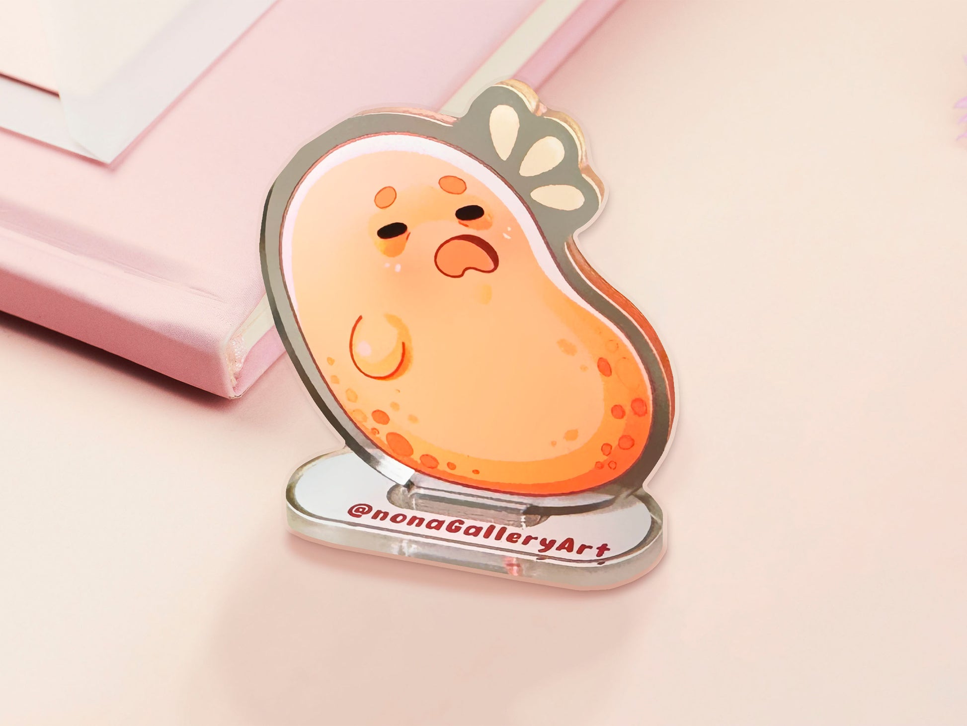 An acrylic double-sided standee desk budy featuring a cute cartoon chibi potato with a stressed expression.
