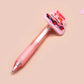Pink ballpoint pen with black ink and a cute chibi guinea pig hamster design.