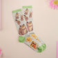 Cute knitted cotton crew socks with cute chibi Tabletop RPG Cryptid Monsters from DND such as Owlbears, Almiraj Rabbits, a Displacer Beast Kitten, Beholder, and Mimic chest