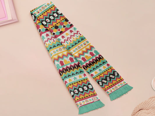 Cute knitted scarf with cute coloured Tabletop boardgame pieces such as meeple mahjong chess monopoly dice ludo and dominos