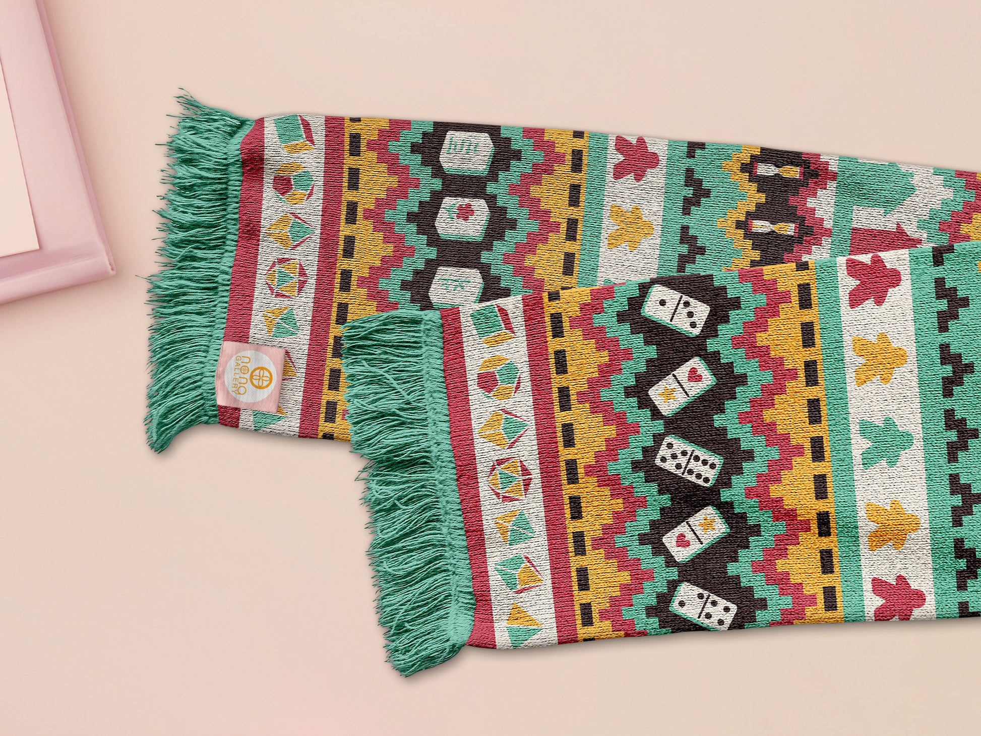 Cute knitted scarf with cute coloured Tabletop boardgame pieces such as meeple mahjong chess monopoly dice ludo and dominos