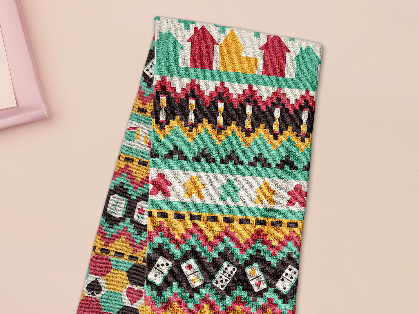 Cute knitted scarf with cute coloured Tabletop boardgame pieces such as meeple mahjong chess monopoly dice ludo and dominos