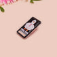 A black acrylic pin badge with a pink heart-shaped pin back clasp. The design of the pin badge is of a cute goose in a shirt and tie with the quote Time For Serious Goose