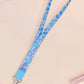 Cute full legth blue lanyard with a double sided underwater fish pattern and silver swivel hook clasp.