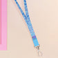Cute full legth blue lanyard with a double sided underwater fish pattern and silver swivel hook clasp.