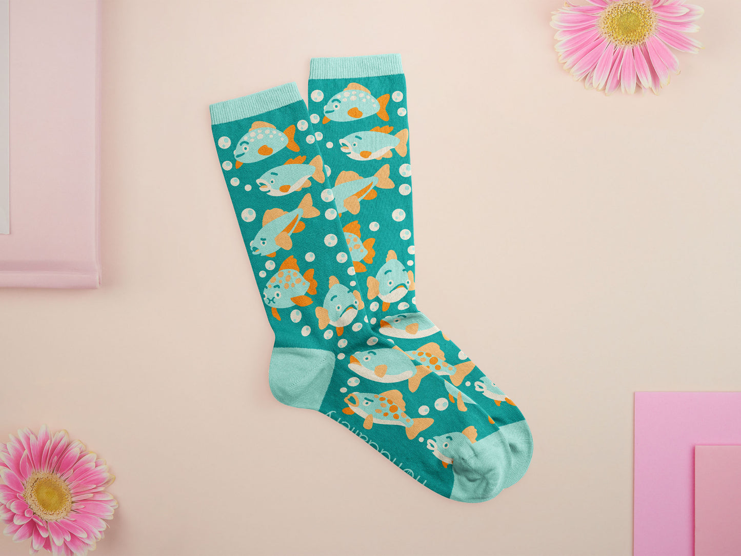 Cute knitted cotton crew socks with an underwater fish design.