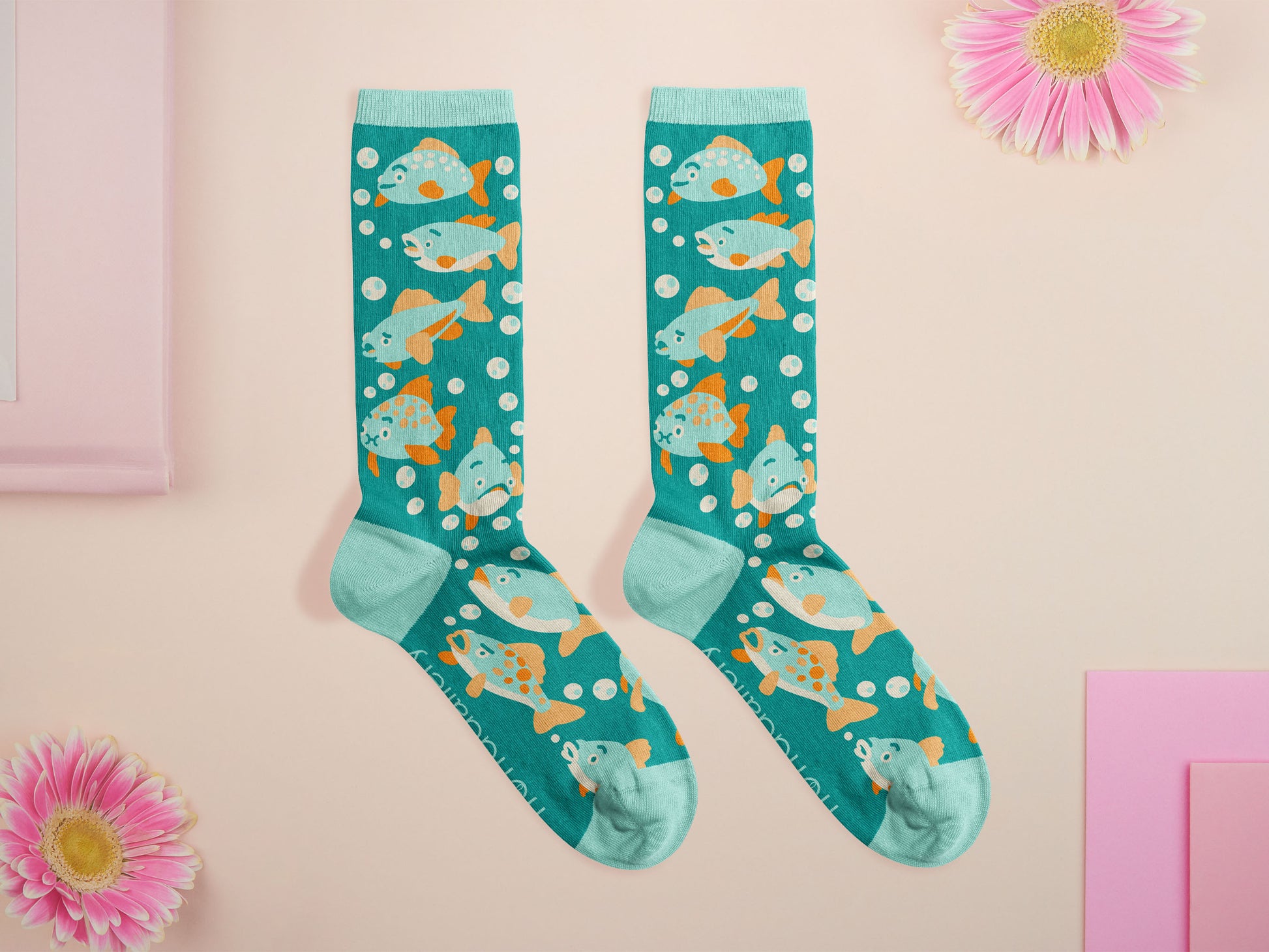 Cute knitted cotton crew socks with an underwater fish design.