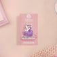 A clear acrylic pin badge with a heart-shaped pin rubber pin back clasp. The design of the pin badge is a cute cartoon screaming possum with the quote why me?!