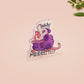 A clear acrylic pin badge with a heart-shaped pin rubber pin back clasp. The design of the pin badge is a cute cartoon screaming possum with the quote why me?!