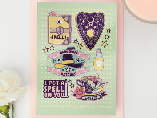Large sticker sheet of digital illustration cartoons witchcraft quotes and items, such as a spell book, Ouija planchette, witch's hat, potions, spells and witch's brew